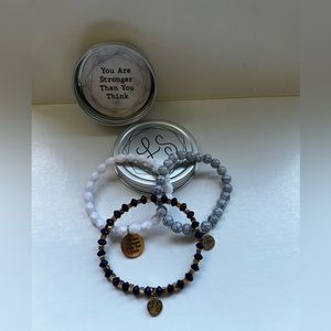 set of 3 bracelets In Tin Container.